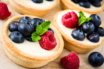 Delicious tartlets with raspberries and blueberries
