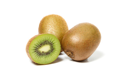 juicy kiwi fruit and sliced segments isolated on white