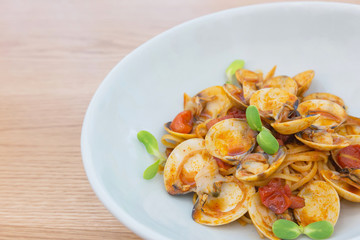 delicious dish of spicy pasta with shellfish and Sunflower sprou