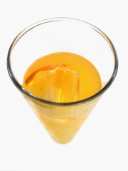 Close-up of glass of orange refreshment