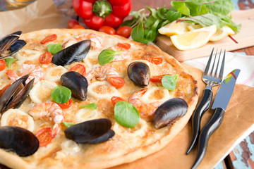 Seafood pizza, mussels, shrimps and squids
