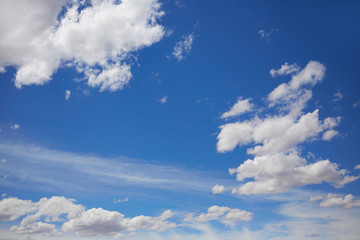 Obraz premium Blue summer sky with white clouds