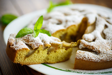 cake with pears in powdered sugar