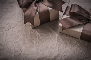 Present boxes with bow on wrapping paper celebrations concept