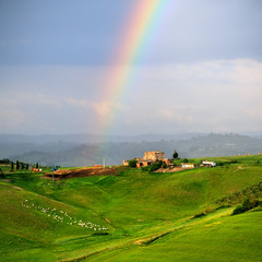 Rainow above tuscany green hills, Italy.