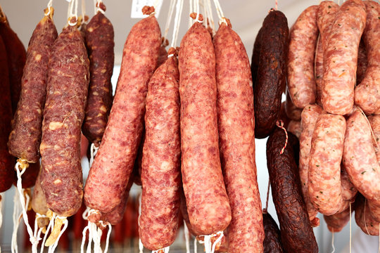 Mediterranean sausages in spain hanging in rows
