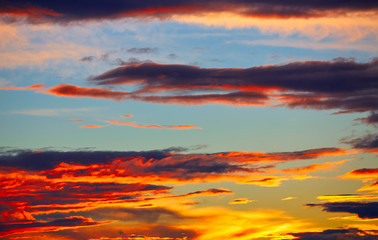 Sunset orange clouds in a blue sky
