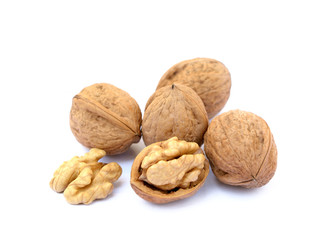 Fresh walnuts with a shell isolated on white background