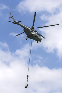Military special forces with a helicopter