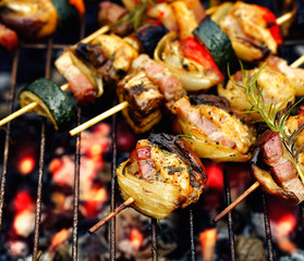 Skewers of meat and vegetables on the grill