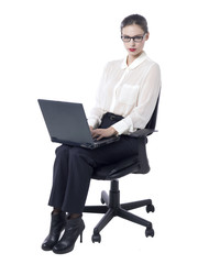 sitting businesswoman with laptop
