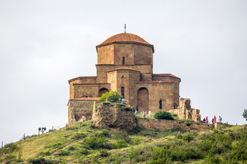 Fototapeta na wymiar Jvari Monastery on mountain. It is a 6-th century Georgian Ortho