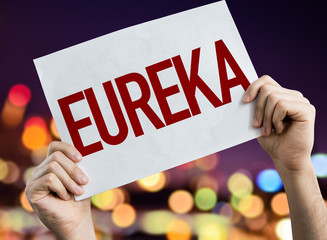 Eureka placard with night lights on background