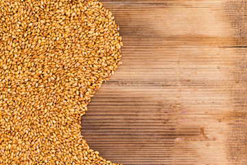 Neat pile of flax seed grains with copy space