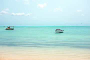 Little old fishing boats at Aruba island in the Caribbean sea