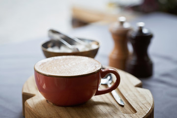 Сup of coffee on a table in cafe