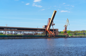 Obraz premium Loading cranes at the Marina in Ventspils