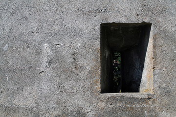 Single Window in the Cement Wall of a Military Bunker