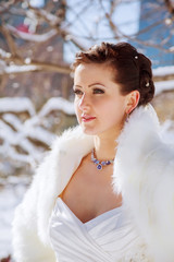 Bride in the winter against the backdrop of New York