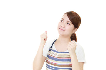 Fototapeta premium ガッツポーズの主婦