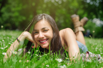 Girl resting in meadow