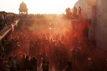 Holi festival enjoying by a crowd in Krishna Temple of Uttar Pradesh,India