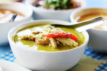 Thai food Green curry Chicken in white bowl.(Kaeng Khiao Wan Kai)