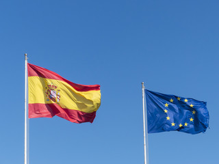 Spanish and European flag waving in the wind.