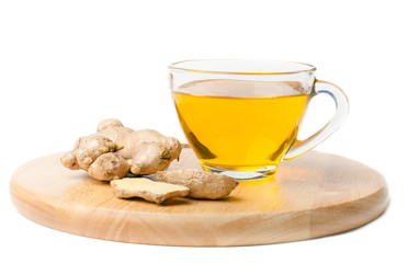 Ginger tea (healthy drink) on wooden plate isolated on white background