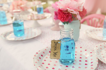 Blue drinks in bottles, Alice in wonderland tea party theme,toning