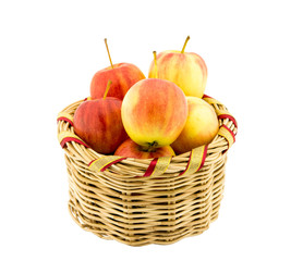 apple in basket on white