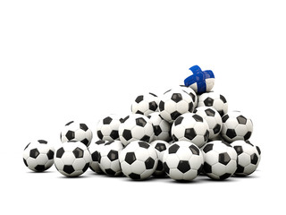 Pile of soccer balls with flag of finland