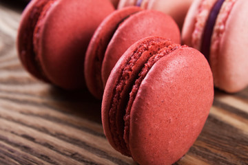 Multicolored macaroon on blue boards.