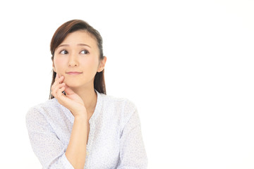 Fototapeta premium 不安そうな表情の女性