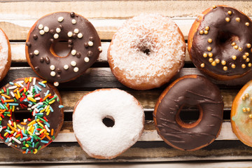 Donuts with sprinkles in a box