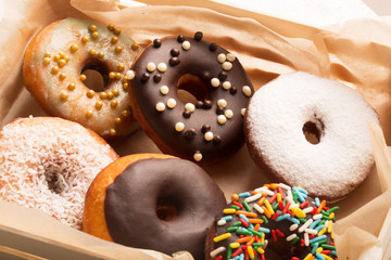 Donuts with sprinkles in a box