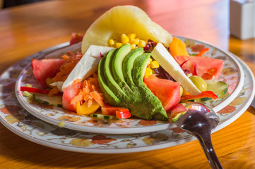 Salad with goat cheese and fresh vegetables