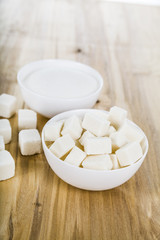 Fototapeta na wymiar Sugar in a white bowl