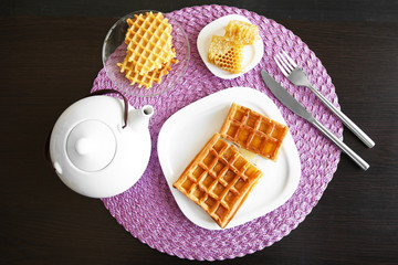 Breakfast with Belgian waffles and honey
