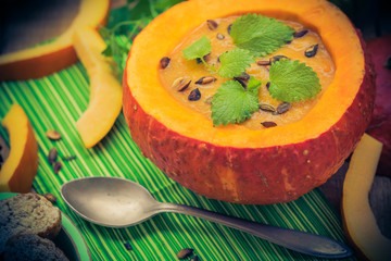 Pumpkin soup served hollow fruit vintage