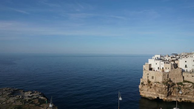 Beautiful timelapse video. The sea and the old town. Polignano A Mare, Puglia, Italy. Sea and rocks
