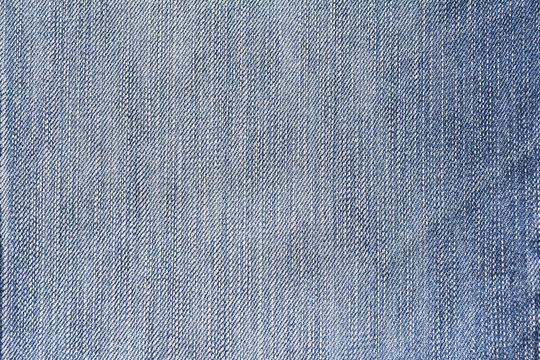 Denim texture. Denim background. Denim jeans. Denim fabric. Denim Surface. Blue jeans. Jeans texture. Jeans background. Jeans fabric. Jeans textile. jeans Surface. Jeans detail. Dark edged.