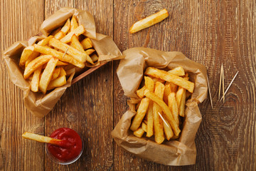 Serving Belgian fries served in a paper box. With or without a d