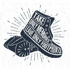 Hand drawn label with textured boots vector illustration and "Take only memories, leave only footprints" inspiring lettering.