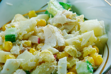 Salad with cod, corn .