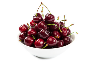 Ripe sweet cherries in a bowl.