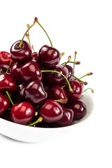 Ripe sweet cherries in a bowl.