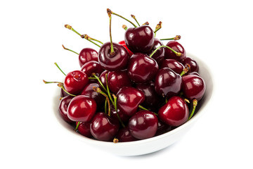 Ripe sweet cherries in a bowl.