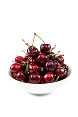 Ripe sweet cherries in a bowl.
