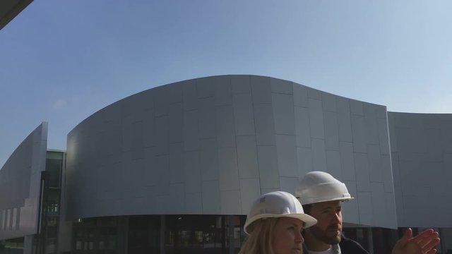 View of a Worker and enginner checking last details before delivery